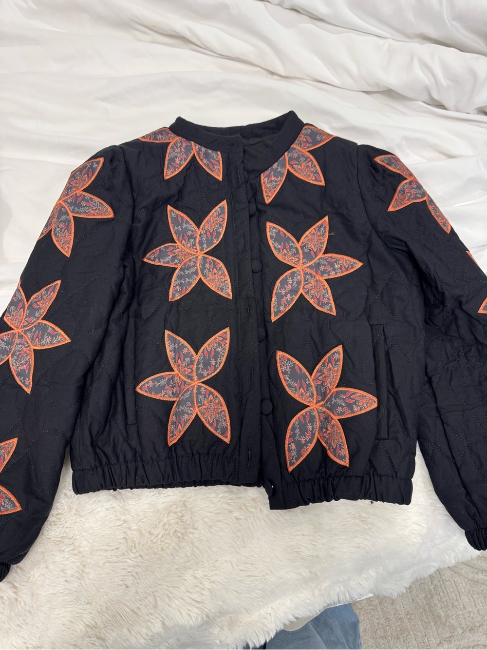Black Quilted Bomber Jacket with Red Floral Print